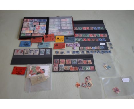 A STAMP COLLECTION, QV - QEII, comprising mostly Commonwealth issues / British Empire to include some early vending machine s