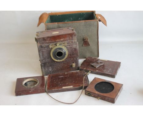 A WATSON AND SONS MAHOGANY TAILBOARD CAMERA, in fitted carry case with various related elements