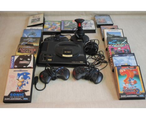 A SEGA MEGA DRIVE GAMES CONSOLE to include Sonic, PGA Tour Golf etc.