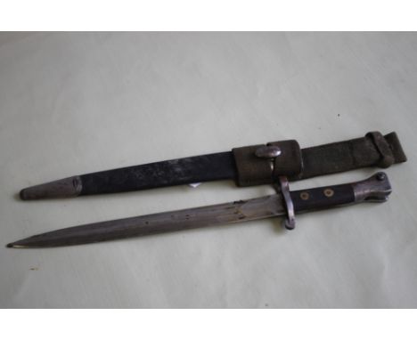 AN 1888 PATTERN WILKINSON BAYONET, with VR markes, with later canvas frog
