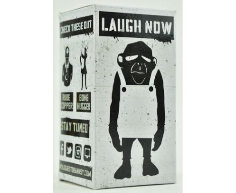 Banksy (British, b 1973) 
APOLOGIES to BANKSY - 'Laugh Now' DIY Art Figure
DIY white collectible customisable vinyl toy figur