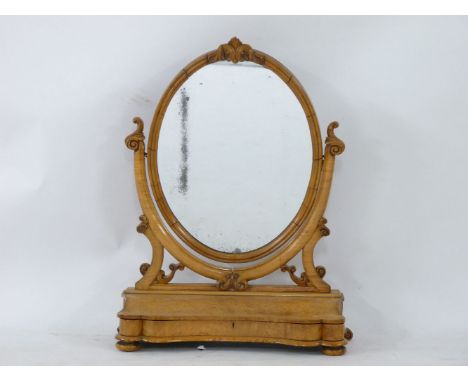 An early Victorian bird's-eye maple toilet mirror, circa 1860, 71cm wide, 30cm deep, 100cm high, provenance Berkswell Hall, W