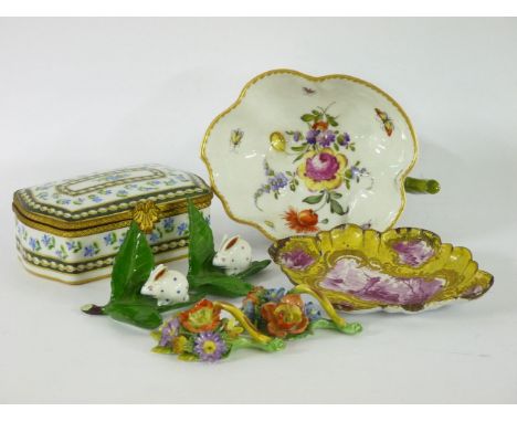 A pair of Dresden menu holders, in the form of floral sprays, 2.5cm long, a pair of Herend ornaments, each a rabbit crouching