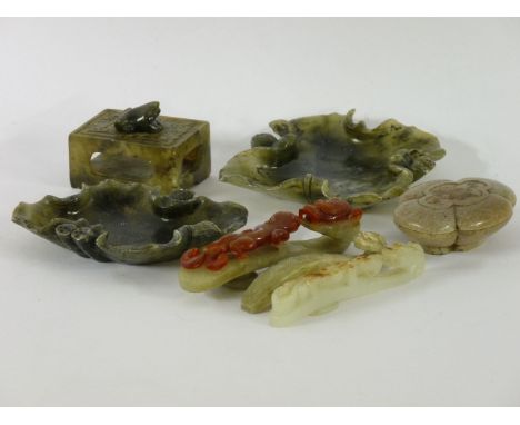Three Chinese jade buckles, two small jade bowls, and a vesta holder, buckles 11, 10 and 9.5cm long (6)