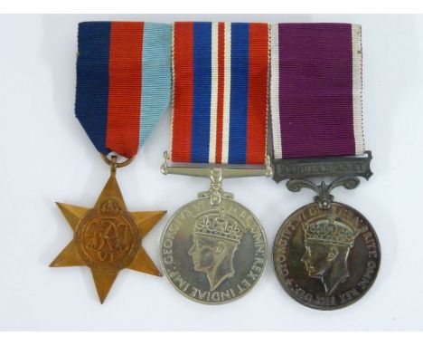 A group of three World War II medals, awarded to 778004 Sergeant J R Cranfield RA, the 1939-1945 Star, the War Medal, Long Se