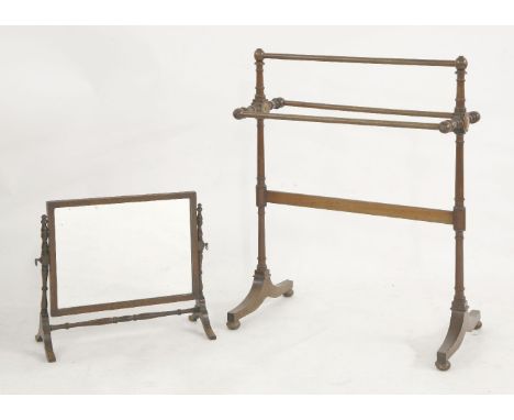 A turned mahogany towel rail, 72cm long, and a cherry wood mirror