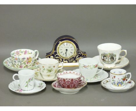 A collection of cabinet cups and saucers, modern