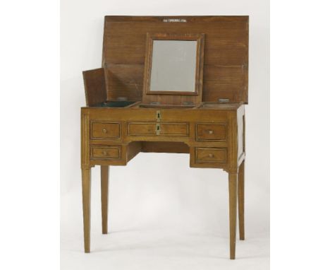 A Continental walnut inlaid dressing table, the hinged top over a central mirror, and two lidded compartments, the front with