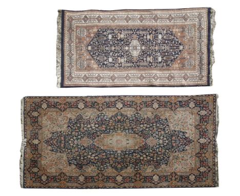 A Simo Kirman rug, with central hanging lantern medallion, within a full floral field and borders, 250 x 152cm, another 188 x