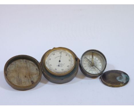 A compensated pocket barometer, by Ross, 111 New Bond Street, London W, 1062, in original leather case, and a brass cased com
