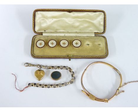 A broken gold bangle, a short section of gold facted belcher chain, a gold heart pendant marked 9ct, part of a hardstone fob,