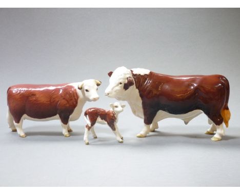 A group of Beswick Hereford cattle, a bull, with nose ring, a cow, 'Champion of Champions', and a calf