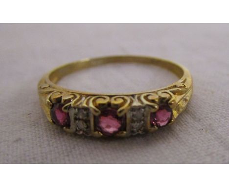 Gold diamond &amp; stone set ring (poss. ruby)