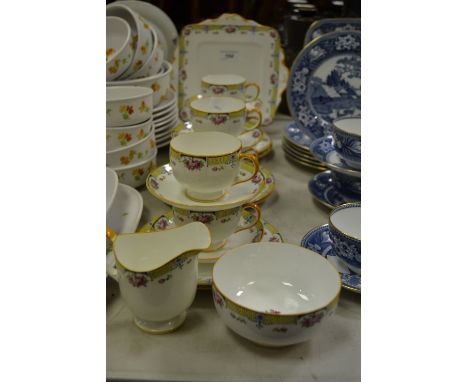 A Paragon tea service, printed with roses, printed mark, X826