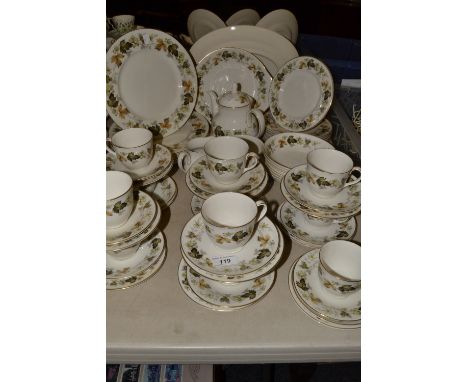 A Royal Doulton Larchment pattern dinner and tea service, including plates, bowls, cups and saucers, tea pot, sugar and cream