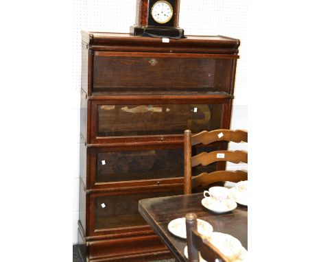 An early 20th century 4 section globe wernike bookcase