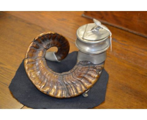An early 20th century ram's horn snuff mull, with pewter mounts, the hinged cover with pigeon finial, 23.5cm high 
