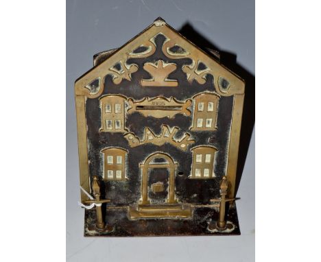 A Victorian novelty iron money box as a house, the front applied with brass banded roof, gable, aperture for coins dated 1865