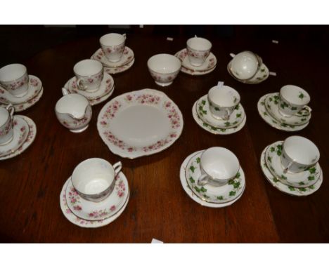 A Colclough Cascade Roses pattern six setting tea service inc Milk jug, sugar bowl, bread plate etc;  another Trailing Ivy pa