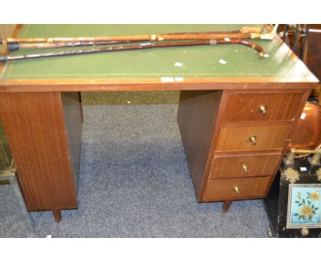 A 20th century veneered kneehole desk, the top with leather panel