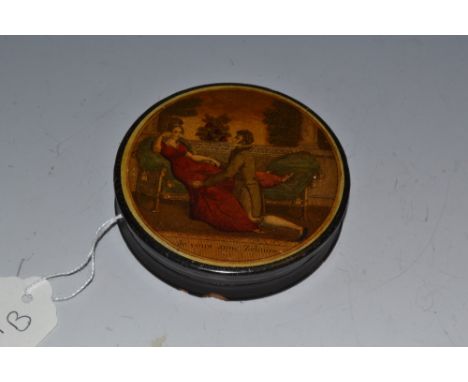 A 19th century French circular papier mache snuff box, the cover with a scene of seduction, c. 1860