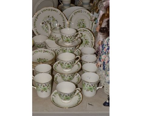 A Colclough tea service,  decorated with green floral sprigs, pattern no. 8648