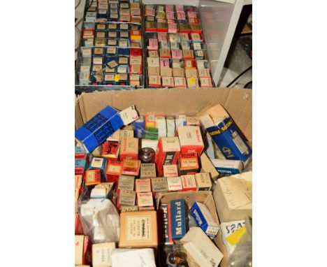 FOUR TRAYS OF VINTAGE VACUUM TUBES (THERMIONIC VALVES), some in original boxes, others loose from makers such as Mullard, Phi