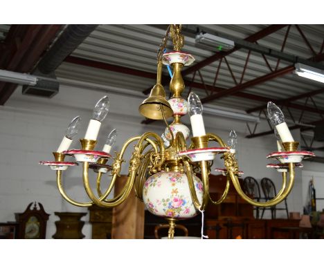 A MODERN BRASS AND FLORAL CERAMIC EIGHT BRANCH CHANDELIER