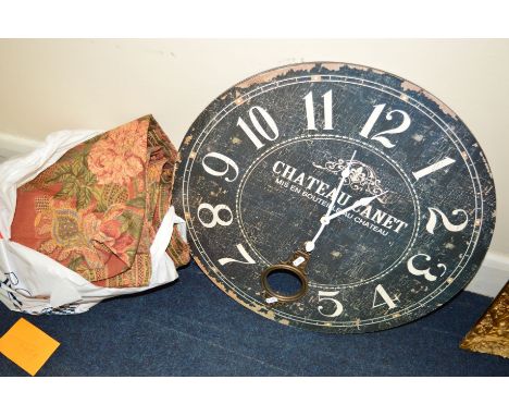A MODERN CIRCULAR FRENCH STYLE WALL CLOCK together with a bag containing a pair of curtains (2)