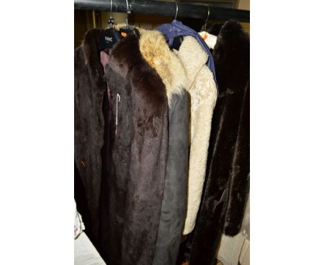 A LONG VINTAGE FUR COAT, a sheepskin long belted coat with fur trim and two other coats (4)