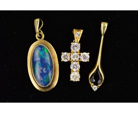 THREE PENDANTS, the first of oval outline set with an opal double (cracked with water damage), with 9ct hallmark, the second 