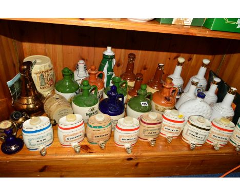 A QUANTITY OF SPIRIT FLASKS etc, to include Wade, 'Sherry', 'Cognac', 'Scotch', 'Bells Whisky', 'Whyte &amp; Mackay', a 'Crie