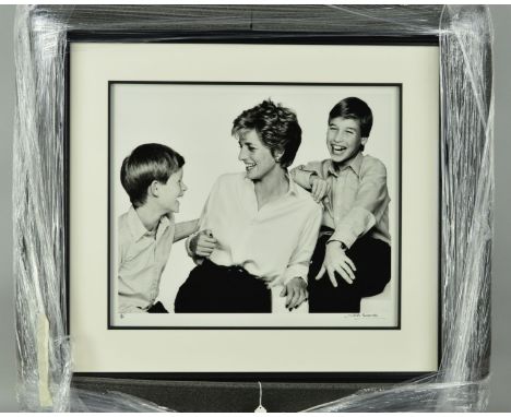 JOHN SWANNELL 'PRINCESS DIANA, PRINCE WILLIAM, PRINCE HARRY 1994', a black and white photographic print, signed bottom right,