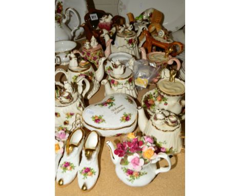 ELEVEN NOVELTY CARDEN/ROYAL ALBERT 'OLD COUNTRY ROSES' TEAPOTS, together with six trinkets (one teapot with loose item)