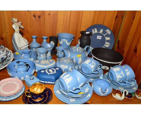 A LARGE GROUP OF WEDGWOOD JASPERWARES, mostly light blue teawares and trinkets, a black bowl and two vases, pink trinket etc,