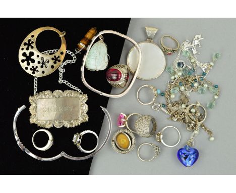 A SELECTION OF MAINLY SILVER AND WHITE METAL JEWELLERY to include a hinged bangle, a mother of pearl circular pendant, a base