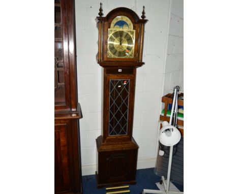 A MODERN OAK LONGCASE CLOCK, the brass face with Roman numerals (two weights and pendulum)