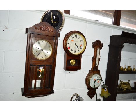 AN EARLY 20TH CENTURY OAK WALL CLOCK, an oak barometer marked E Roberts, Rochdale and two other modern wall clocks (4)