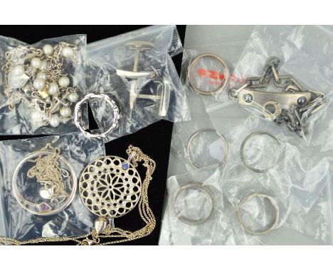 SIX ITEMS OF TITANIUM JEWELLERY AND FIVE ITEMS OF DESIGNER JEWELLERY, the titanium jewellery includes four band rings, a pair