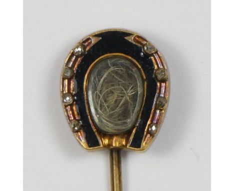 A Victorian gold and enamel mourning horseshoe stickpin, the locket with coarse hair (horse?), rose diamond set nails