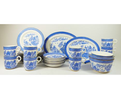 A Royal Worcester Willow pattern afternoon tea service for six place settings, green backstamp, comprising tea cups, saucers,