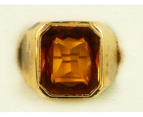 A gold mounted rectangular citrine ring, tests as 18ct, the stone of good colour, 14 x 11mm, K, 6.7gm 