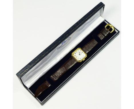 Roy King, a silver gilt manual wind wristwatch, London 1975,  the white enamel dial with Roman numerals, 25mm, leather strap.