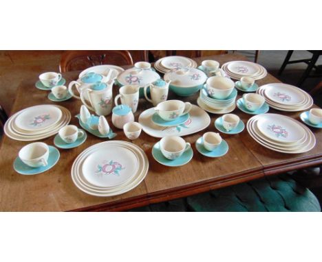 A LARGE COLLECTION OF POOLE POTTERY DINNERWARE AND TEA WARE,  in the 'Red Pippin' pattern designed by Ruth Pavely, comprising