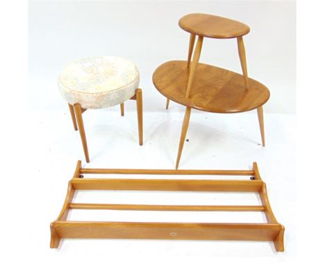 A GRADUATED PAIR OF LIGHT ERCOL 'PEBBLE' OCCASIONAL TABLES,  (from a nest of three), the larger 65cm wide 44cm deep, the smal
