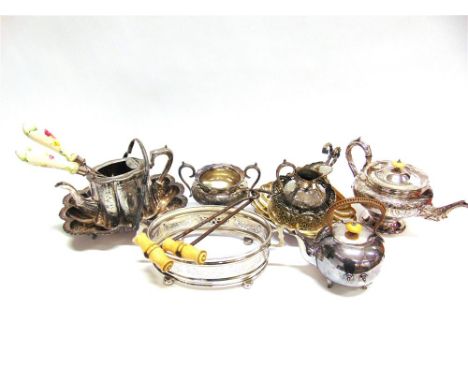 A QUANTITY OF PLATED WARE  including a three piece tea service; a swing handled basket; a cocktail shaker; and a wine coaster