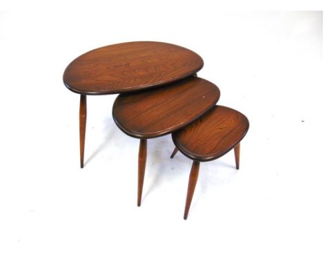 A GRADUATED NEST OF THREE ERCOL 'PEBBLE' COFFEE TABLES,  the largest 65cm long 45cm deep 40.5cm high (3)
