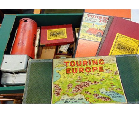 ASSORTED TOYS & GAMES comprising a German printed tin money box; a Chad Valley bagatelle; and other items.