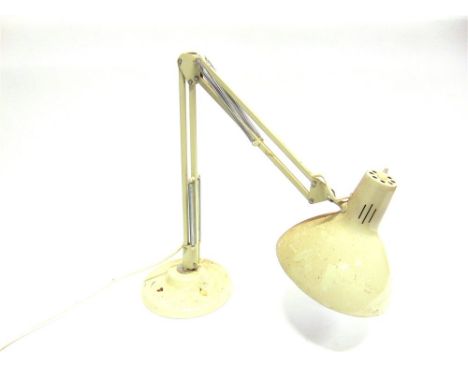 AN ADJUSTABLE DESK LAMP,  the stepped circular base with cast iron insert, 89cm high fully extended