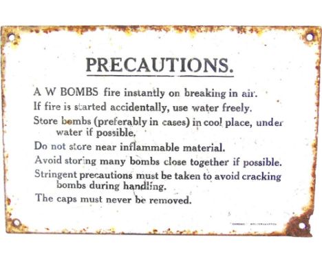 A SECOND WORLD WAR ENAMEL SIGN 'Precautions / A W BOMBS fire instantly on breaking in air.... ', by Chromo of Wolverhampton, 